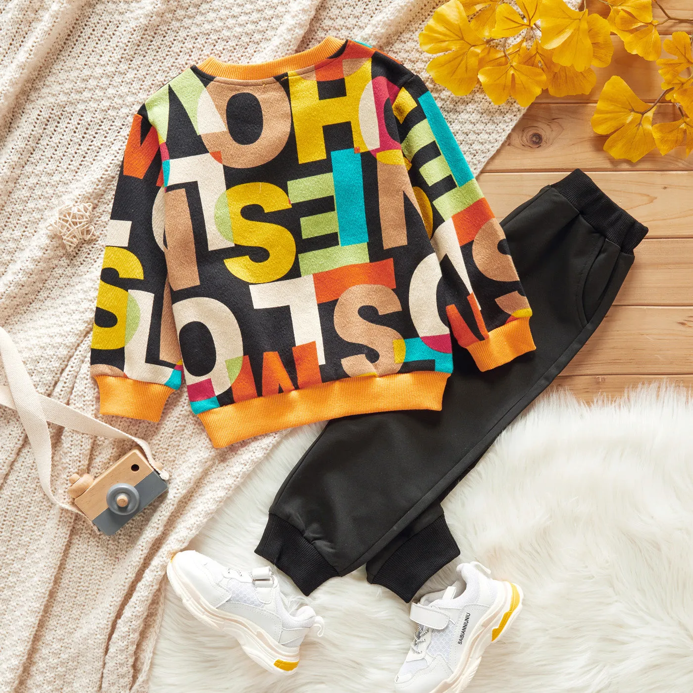 2-piece Toddler Girl/Boy Letter Print Colorblock Pullover and Elasticized Pocket Black Pants Set